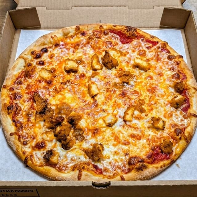 MEDIUM CHICKEN PARM PIZZA.