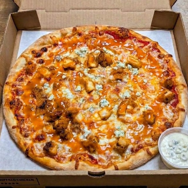 MEDIUM BUFFALO CHICKEN PIZZA.