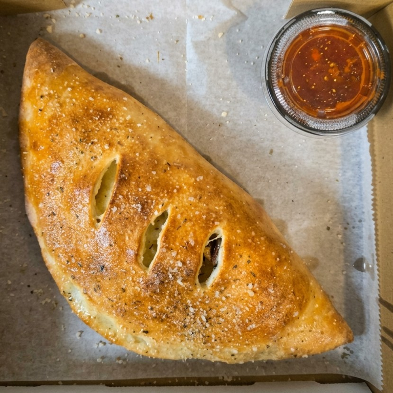 Savor Our Calzone Today